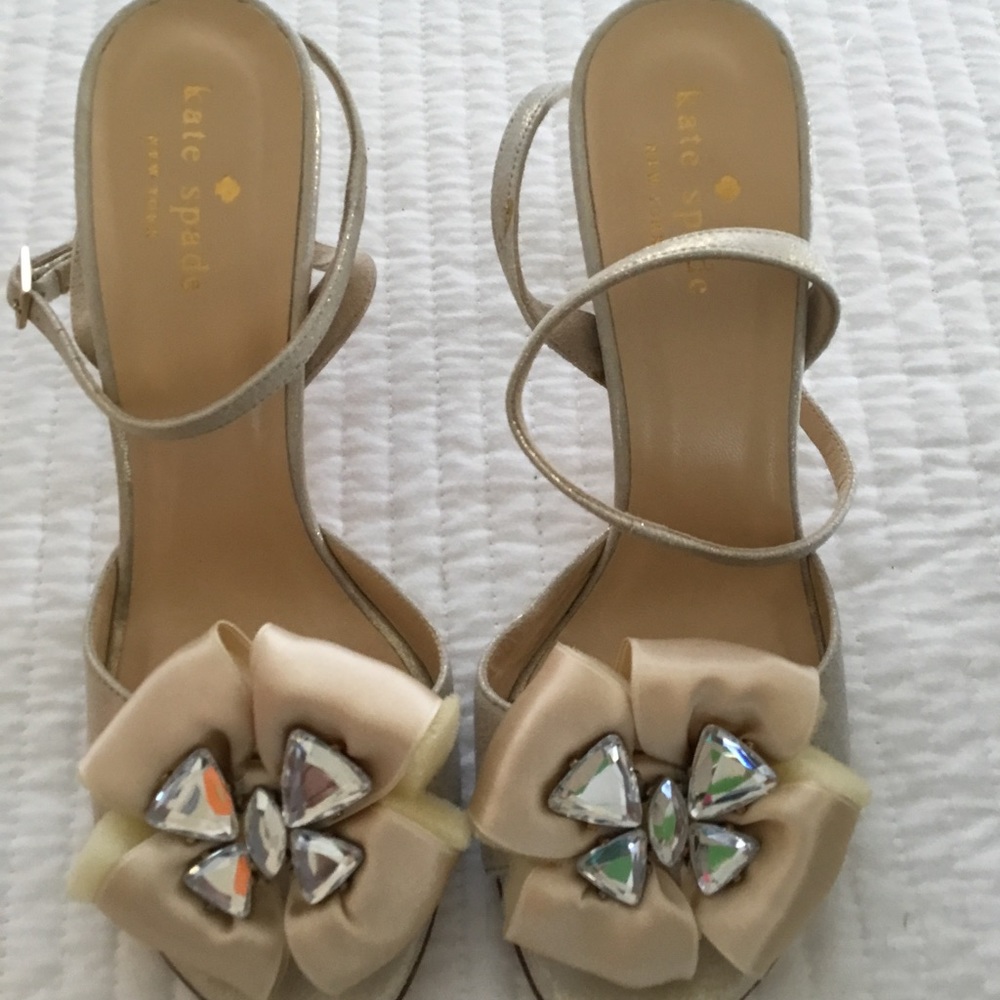 Kate Spade liquid iridescent ivory heals.